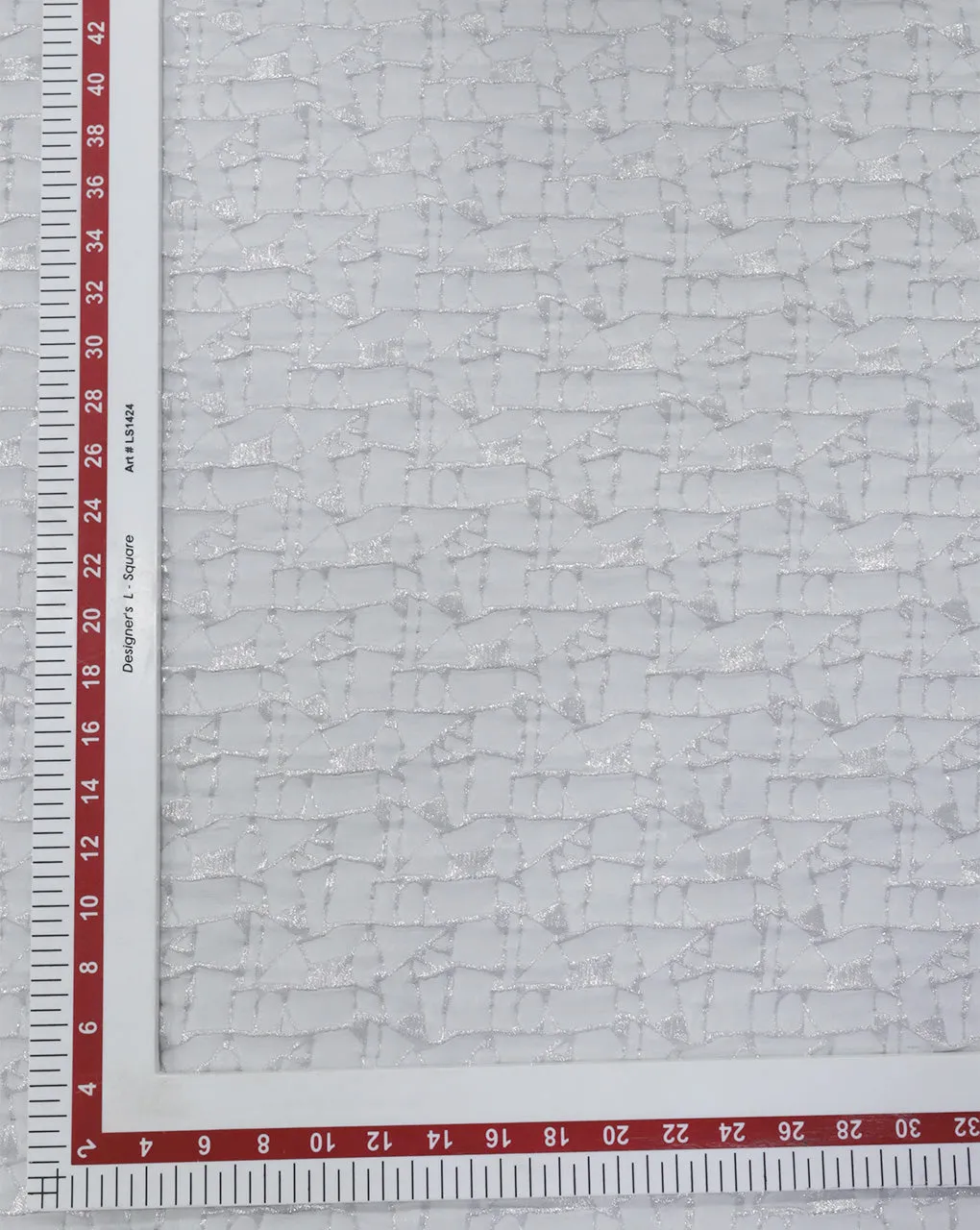 WHITE POLYESTER EMBOSSED JACQUARD FABRIC